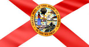 Die flagge von florida besteht aus einem roten andreaskreuz auf weißem hintergrund, mit dem siegel floridas in der mitte. Shutterstock