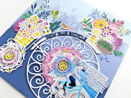 This garden gate features 2 songbirds and a blooming rose. New Blue Bicycle Layout Paige Taylor Evans