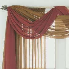 Window treatments can be a fun and exciting way to change the appearance or feel of a choosing a window valance treatment style, keep it mind it will not cover your windows, so if you are looking for privacy you will need to include a. Ways To Hang Scarf Valances Hunker Scarf Valance Ideas Curtains Living Room Swag Curtains