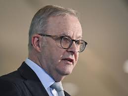 Protester Wayne Warton pleads guilty to storming Kevin Rudd's office but  denies assault