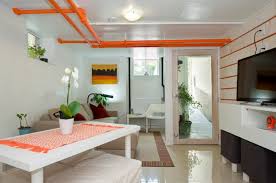 Turn Eyesores Into Decor By Painting Exposed Pipes With Quirky Bold Colors Once Painted These Oddities Often Hi Dropped Ceiling Low Ceiling Basement Ceiling