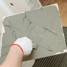 Laying floor tiles on cement sheet. Floor Tile Installation Methods Tile Doctor