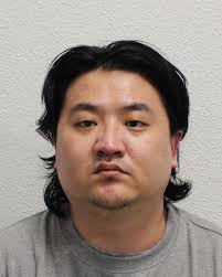A man has been jailed for life for fatally stabbing his victim during an  unprovoked attack in a Battersea car park two years ago. Earl Morin-Briton,  36 of Sutton was found guilty