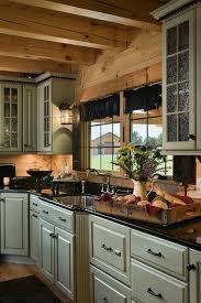 Rustic Traditional Kitchen Pistachio Green Cabinets Black Granite Home Accents And Lighting For T Log Home Kitchens Rustic Kitchen Design Log Cabin Kitchens