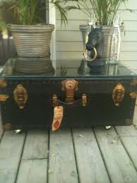 Sei furniture southern enterprises steamer storage trunk cocktail table, walnut finish. Antique Steamer Trunk Relined Castor Wheels And Glass Top Added Unique Coffe Coffee Table Trunk Trunk Makeover Antique Steamer Trunk