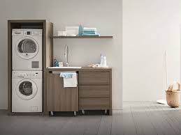 Cette armoire a été spécialement conçue pour accueillir un espace buanderie : La Buanderie A La Maison 27 Idees D Amenagement Pratique