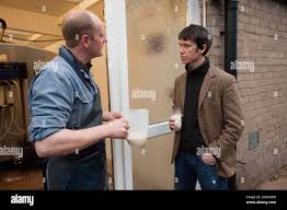 Rory Stewart, the Conservative parliamentary candidate for the Penrith and  the Border's constituency, speaking with farmer Richard Gibson during the  morning milking. Part of Rory's 2010 general election campaign.  Castlesteads Farm, Plumpton,