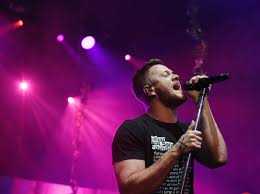 Their music ranges from self empowerment anthems to tunes about the darkest hour Imagine Dragons S New Album Origins Reveals Singer Dan Reynolds S Angst