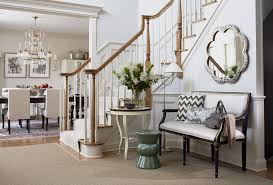While the walls of the staircase are decorated with photos and paintings, the stairs. 35 Stairwell Decorating Ideas Chairish Blog