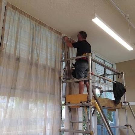 Charlton SE7 specialist fitting curtain track above a bay window
