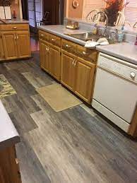 Oh Gross Is This What Alabaster Oak Would Look Like With Oak Cabinets Gross Vinyl Plank Flooring Plank Tile Flooring Flooring