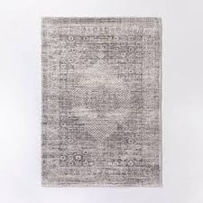 A look we love that adds dimension and character to any space! Millcreek Distressed Vintage Persian Rug Charcoal Threshold Designed With Studio Mcgee Target