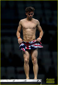 Tom daley became a poster boy for the london 2012 olympics, with his image on banners and billboards all over the u.k. Tom Daley Wins Gold At Diving Championship Husband Dustin Lance Black Cheers Him On Photo 3933387 Dustin Lance Black Shirtless Speedo Tom Daley Pictures Just Jared