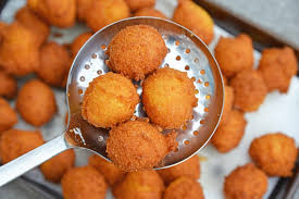 Drop spoonfuls of the batter carefully into the hot oil and deep fry the hush puppies until golden brown. Easy Southern Hush Puppies Recipe Fried Cornbread In 30 Minutes