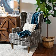 The wingback chair has a long history that reaches back to 17th century england. Charcoal Plaid Wingback Chair With Heirloom Legs Kirklands