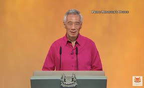 The rain poured down, but the contingents stood steady, and marched past proudly, drenched, yet undaunted. Hlhmmylpdhydwm