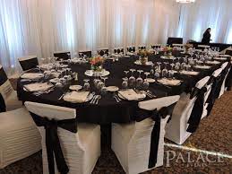 black sashes and white chair covers black chair covers chair covers wedding white chair covers