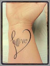 That special person could be a family member, a life companion, a friend or even an animal. My Tattoo Finally Did It And Love Love Love It Hubby S Writing For The Word Itself And My Boys Tattoos For Daughters Fingerprint Tattoos Tattoos For Kids