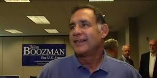 Ads from soft-spoken Arkansas Sen. Boozman reflect GOP fury