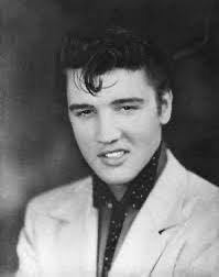 A young Elvis at Poplar Tunes Record Store in Memphis ❤️ 1957