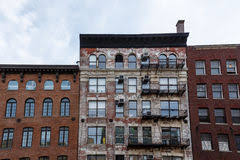 Most units have a control on this opening that allows the user to open it or close it. Pattern Of Fire Escapes And Window Air Conditioning Units On Side Of Old Brick Building Editorial Photography Image Of York Landmark 68880202