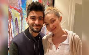 Zayn malik and gigi hadid attend the manus x machina: Gigi Hadid Zayn Malik Found Out Their Baby S Gender Via This Creative Cake Check Out