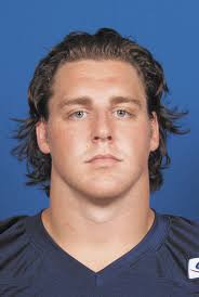 COLLEGE FOOTBALL: Fighting through the pain for 1 more year