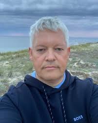 Séba Dolimont** started up **Side-Line** in the previous era (we are  talking about before the year 2000) and is still going on. He launched and  helped out a lot of bands and