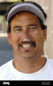 Former Shyline High Football coach John Beam at his new job at Laney  College in Oakland Calif. Wednesday afternoon June 16, 2004, as he walks  thru the weight room to visit with