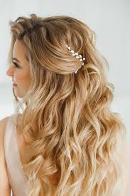 Cascading half updo hairstyle with age when hair is thinning this updo can prove to be your staple style. 6 Beautiful Half Up Hairstyles Perfect For Bridesmaids Pinkvilla