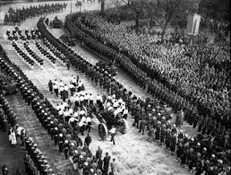 The funeral procession of Eva Perón, the First Lady of Argentina, who died  age 33 from cancer in 1952. She was a poor girl who married the President  of Argentina. She became