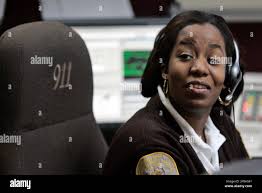 Brunswick County Dispatcher and Chief of Communications Joy Seward, man's  the desk in her office in Lawrenceville, Va., Thursday, Jan. 29, 2009. The  staff of Brunswick County's sheriff's department is stretched to