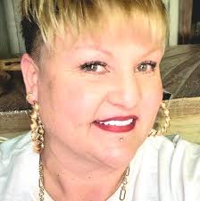 Vintage bronze letter or paper clip, often sold as a souvenir from Greece.  The medallion