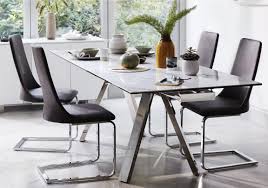 Seats up to 4 people, ideal for any dining area, such as a kitchen, dining room, dinette, or small apartment. Nevada Extending Dining Table Extendable Dining Table Steel Dining Chairs Glass Dining Table