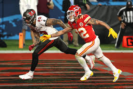 The tampa bay buccaneers' tom brady gets a hug after winning super bowl lv at raymond james stadium in tampa, florida, on february 7, 2021. Ghrqveqgafgwhm