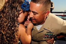 Chief Machinist's Mate Steven Archuleta is pinned by his family during a  chief petty officer pinning ceremony aboard the Nimitz-class aircraft  carrier USS Carl Vinson (CVN 70).