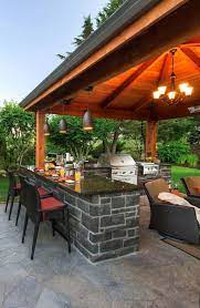 A fans of shabby chic style will love this outdoor kitchen idea. The Best Outdoor Kitchen Design Outdoor Kitchen Ideas Backyard Outdoorkitchendesignslayoutpati Backyard Patio Outdoor Kitchen Design Outdoor Kitchen Bars