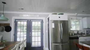 The first shiplap plank you add to the wall is the most important to get nice and square because everything else will line up with that one. Diy 003 Kitchen Shiplap Ceiling Love The Room