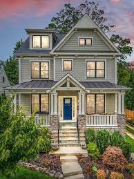 Custom Grey House With Black Metal Roof