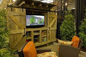 Super simple outdoor tv cabinet made for 50 tv out of pressure treated lumber and some barn style hardware. Patio Entertainment Center With Barn Door Closure At 2016 Indianapolis Home Show Patio Entertaining Patio Pool Patio