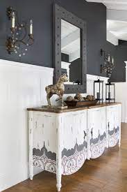 30 Creative Ideas For Styling A Console Table How To Style A Console Table An elegant gold console table with a glass top to show off the decor underneath.