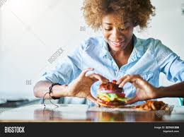 Gumbo, whose name is derived from an african word for okra (kingombo), is the standard creole dish and a true melting pot of cultural influences. African American Woman Image Photo Free Trial Bigstock