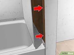 The original tub almost always needs to be cut into pieces to fit through the bathroom door. How To Replace A Bathtub With Pictures Wikihow