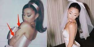 Apart from sharing pictures of her intimate wedding, the singer also performed on the stage of iheartradio music awards 2021 with the weeknd. Ariana Grande Covered Up Some Of Her Biggest Tattoos For Her Wedding