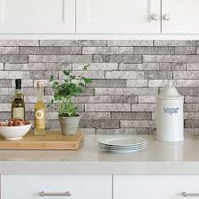 These fabulous peel and stick tiles will add sophisticated flair and design to your kitchen backsplash, fireplace mantel, stair treads, half wall, bathroom or nook. Bhf3049 Grey Stone Peel Stick Backsplash By Brewster