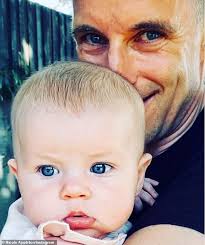 Nicole Appleton shares photo of her boyfriend Stephen Haines cuddling their  baby daughter Skipper