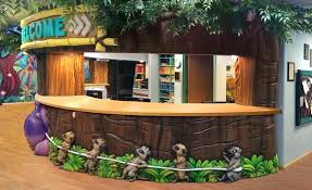 Let The Games Begin Themed Dental Office Photos Dental Office Reception Desk Dental Office Design