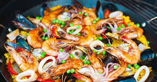 Recette De Paella Grillee Aux Fruits De Mer Zeste Recette Paella Recette Paella Fruits De Mer
