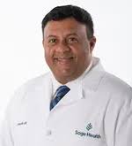 Dr. Raymond W. Doyle, MD