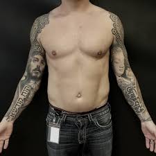 Tattoo artist Chris Adamek USA